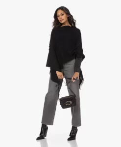 Repeat Franje Poncho In Biologisch Cashmere - Zwart -Kleding Series Winkel 221121 d6561db1 b0e1 4fec 8397 80e3f69b7265 scaled