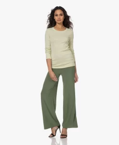 Norma Kamali Tech Jersey Wijde Pijpen Broek - Celadon -Kleding Series Winkel 230111 83f5d11a 53af 4d82 b750 224332f54e2e scaled