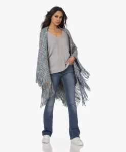 Manos Del Uruguay Merino Wolmix Poncho - Blauw/Grijs 18 Manos Del Uruguay Merino Wolmix Poncho - Blauw/Grijs -Kleding Series Winkel 230412 8e65850c 54ad 4dcb a714 d406c5a8b1be scaled