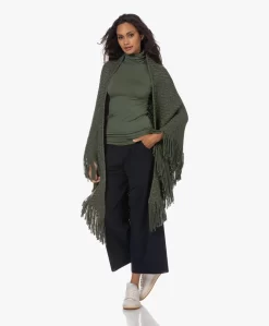 Manos Del Uruguay Merino Wolmix Poncho - Olijf -Kleding Series Winkel 230704 fbd3702c f330 47c5 8ebe 9eaed42c9195 scaled